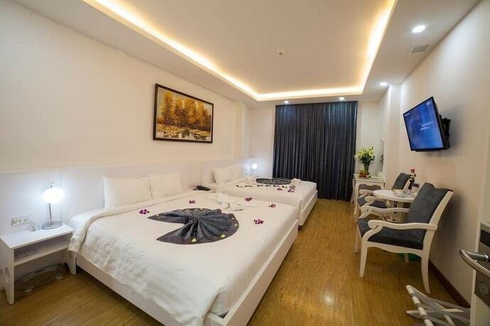 Imagen de la habitación del Hotel La Perle Hue. Foto 24