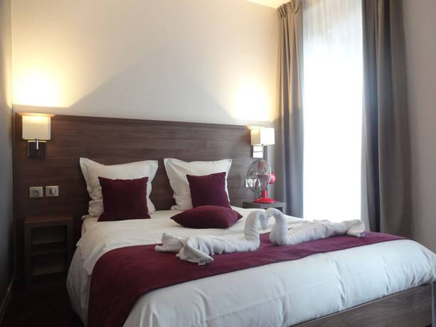 Imagen de la habitación del Hotel La Perle Montparnasse. Foto 4