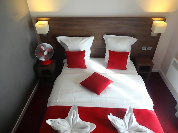 Imagen de la habitación del Hotel La Perle Montparnasse. Foto 12