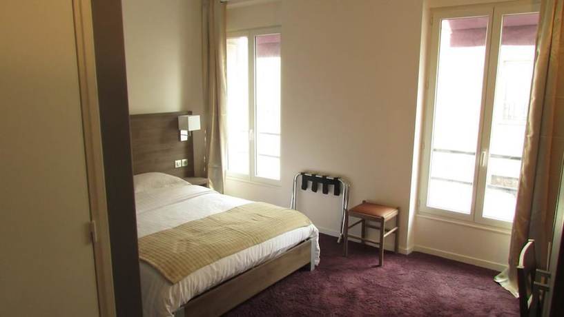 Imagen de la habitación del Hotel La Perle Montparnasse. Foto 14