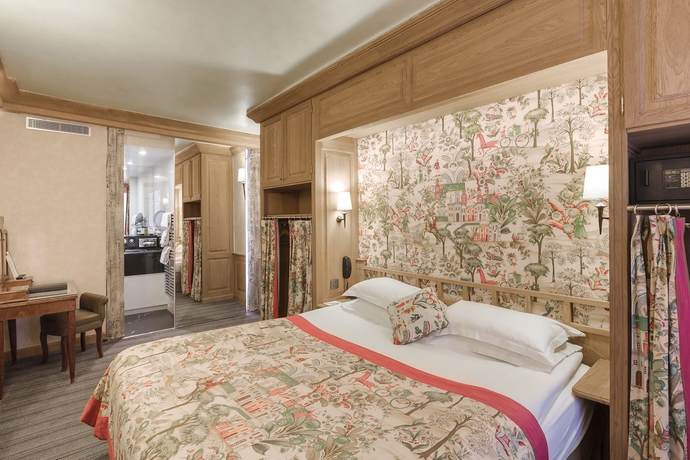 Imagen de la habitación del Hotel La Perle, París. Foto 6