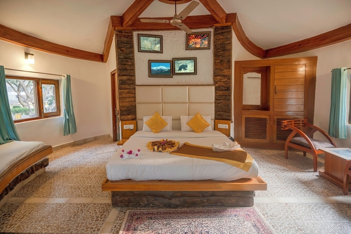 Imagen de la habitación del Hotel La Perle River Resorts. Foto 4