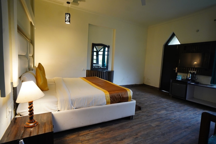 Imagen de la habitación del Hotel La Perle River Resorts. Foto 10