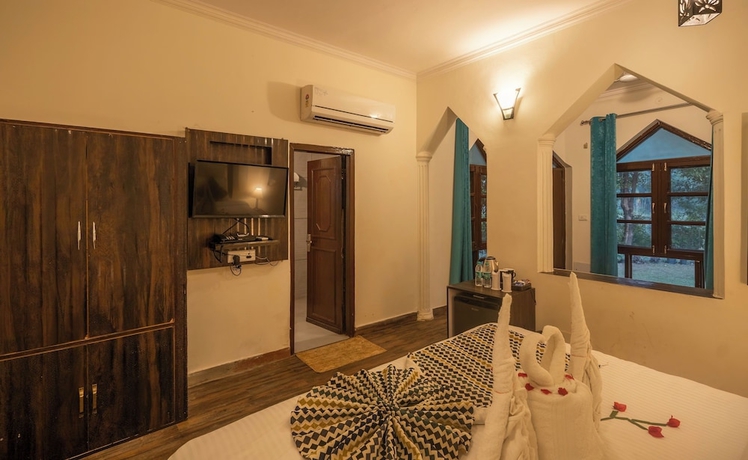 Imagen de la habitación del Hotel La Perle River Resorts. Foto 11