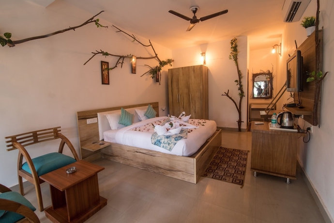 Imagen de la habitación del Hotel La Perle River Resorts. Foto 13