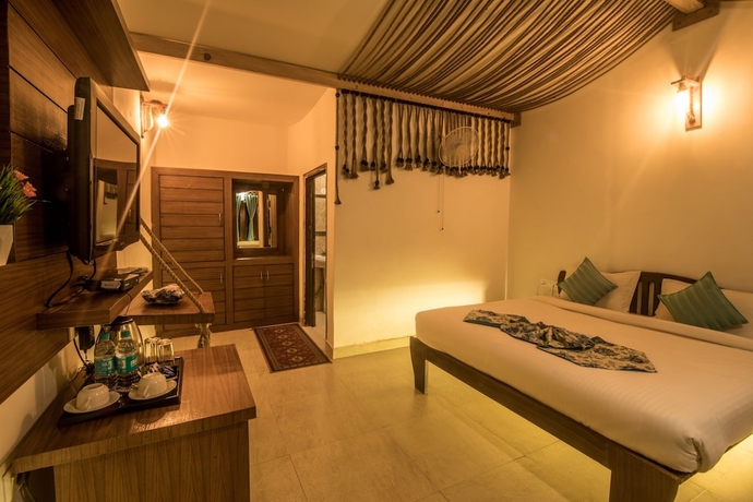 Imagen de la habitación del Hotel La Perle River Resorts. Foto 14