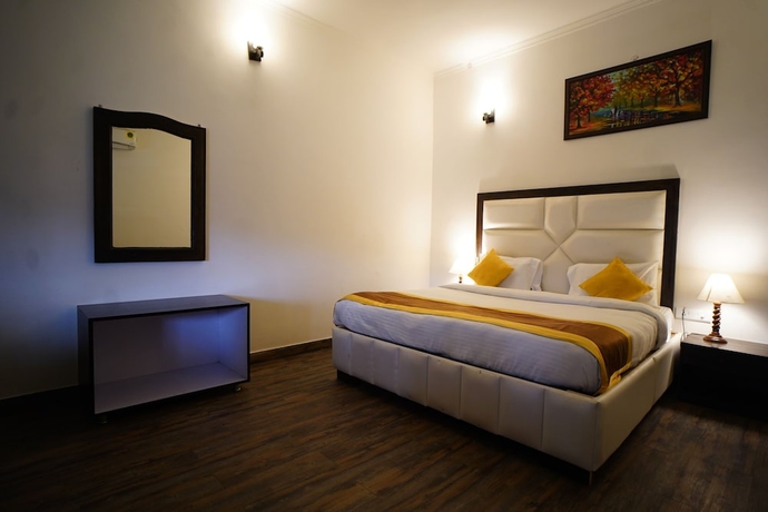 Imagen de la habitación del Hotel La Perle River Resorts. Foto 17