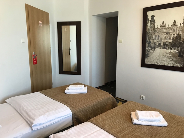 Imagen de la habitación del Hotel La Petite B&b. Foto 10