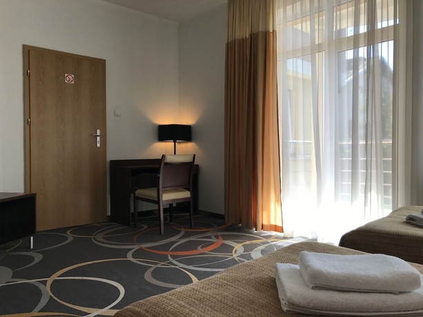 Imagen de la habitación del Hotel La Petite B&b. Foto 11