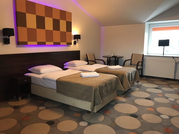 Imagen de la habitación del Hotel La Petite B&b. Foto 17