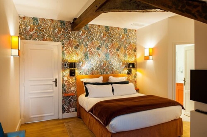 Imagen de la habitación del Hotel La Petite Folie. Foto 2