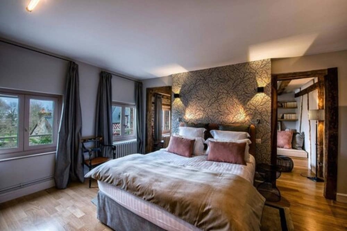 Imagen de la habitación del Hotel La Petite Folie. Foto 4