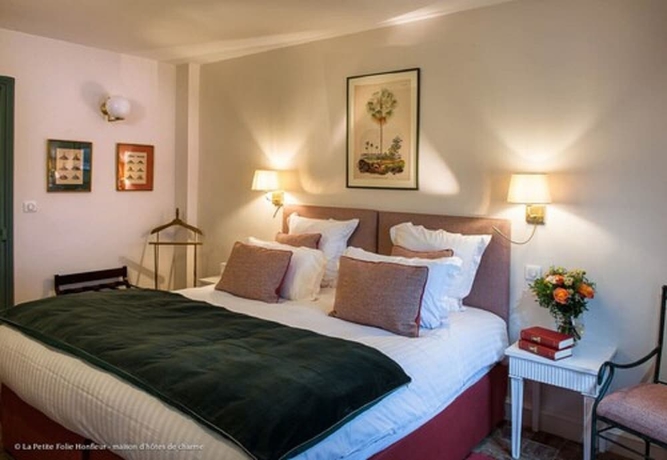 Imagen de la habitación del Hotel La Petite Folie. Foto 5