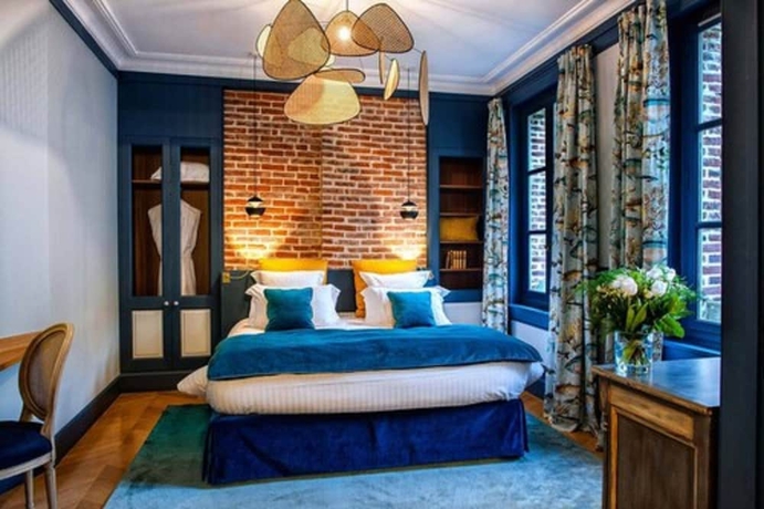 Imagen de la habitación del Hotel La Petite Folie. Foto 6