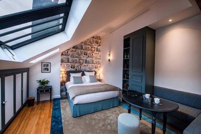 Imagen de la habitación del Hotel La Petite Folie. Foto 9