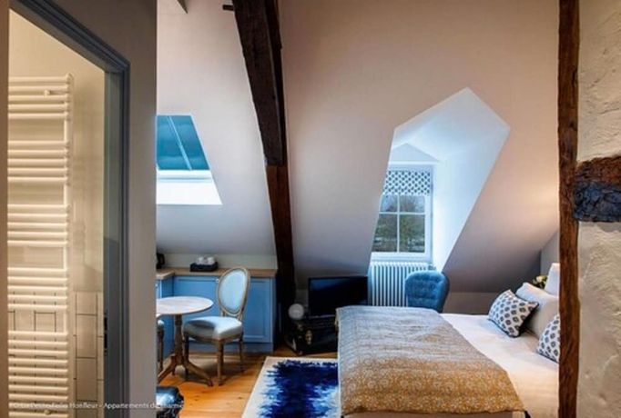 Imagen de la habitación del Hotel La Petite Folie. Foto 10
