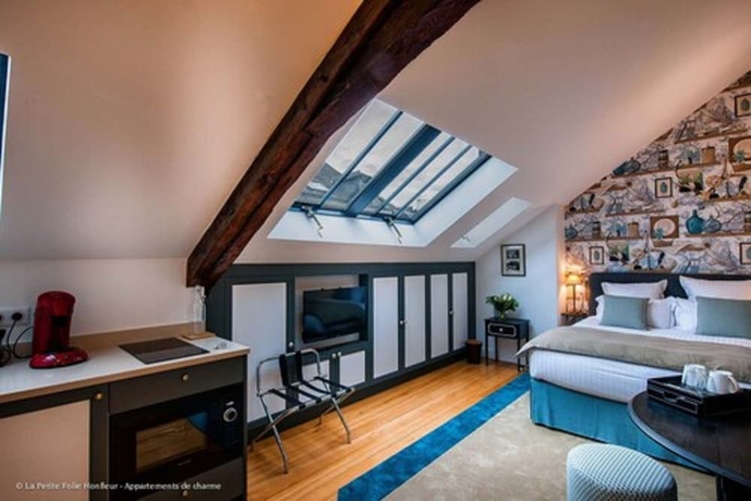 Imagen de la habitación del Hotel La Petite Folie. Foto 12