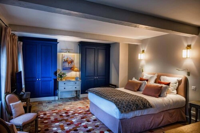 Imagen de la habitación del Hotel La Petite Folie. Foto 13