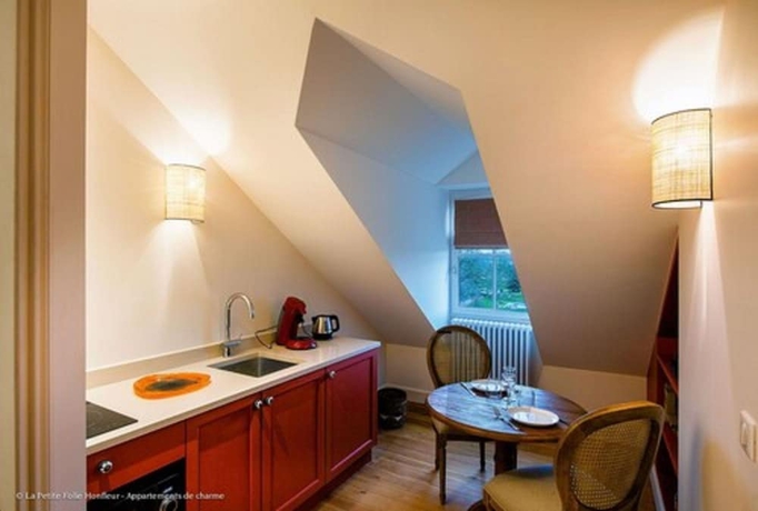 Imagen de la habitación del Hotel La Petite Folie. Foto 14