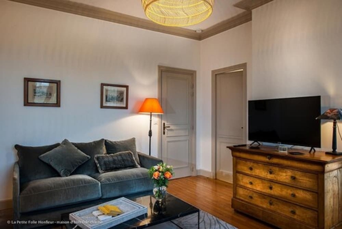 Imagen de la habitación del Hotel La Petite Folie. Foto 19