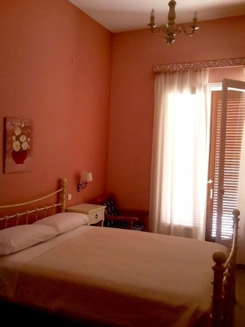 Imagen de la habitación del Hotel La Petite Planete. Foto 14