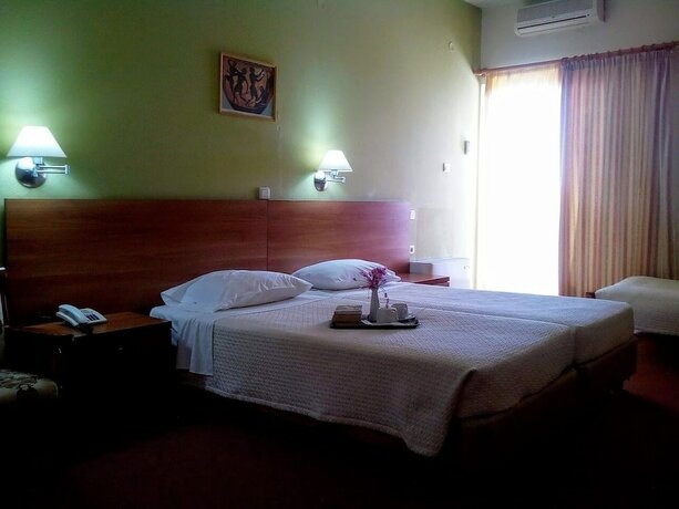 Imagen de la habitación del Hotel La Petite Planete. Foto 18