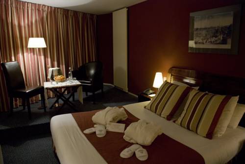 Imagen de la habitación del Hotel La Petite Rade. Foto 4
