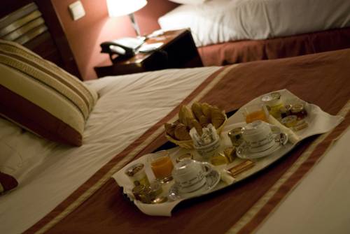 Imagen de la habitación del Hotel La Petite Rade. Foto 5