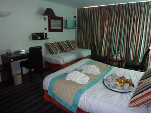 Imagen de la habitación del Hotel La Petite Rade. Foto 7