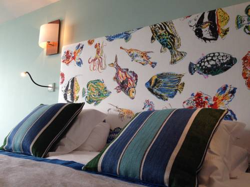 Imagen de la habitación del Hotel La Petite Rade. Foto 9