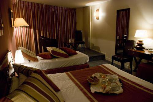 Imagen de la habitación del Hotel La Petite Rade. Foto 16