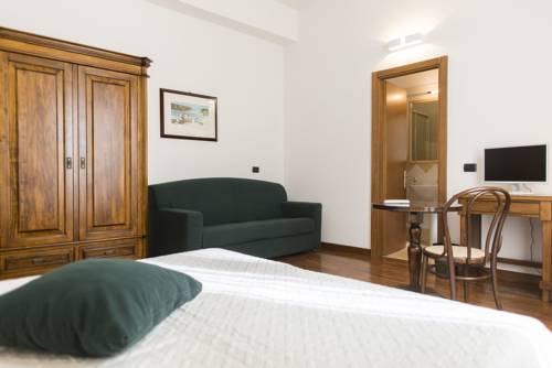 Imagen de la habitación del Hotel La Piazzetta, Castellammare del Golfo. Foto 6