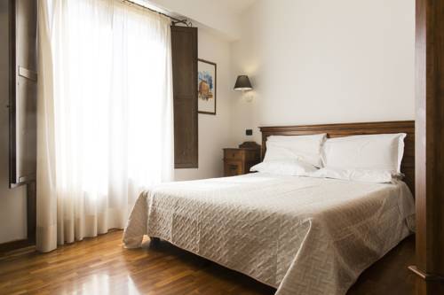 Imagen de la habitación del Hotel La Piazzetta. Foto 12