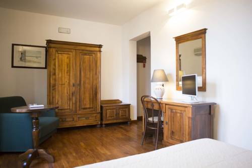 Imagen de la habitación del Hotel La Piazzetta. Foto 16
