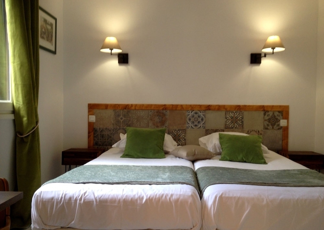 Imagen de la habitación del Hotel La Picholine. Foto 11