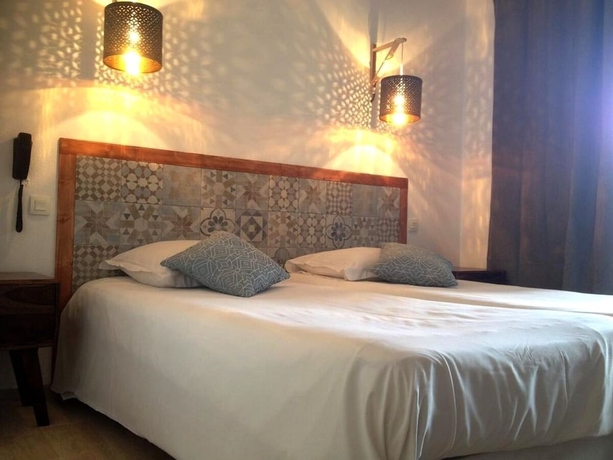 Imagen de la habitación del Hotel La Picholine. Foto 14