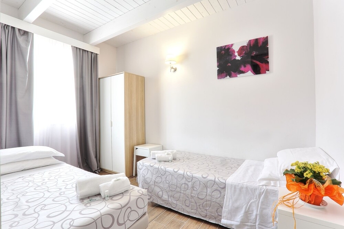 Imagen de la habitación del Hotel La Pineta, Follonica. Foto 7