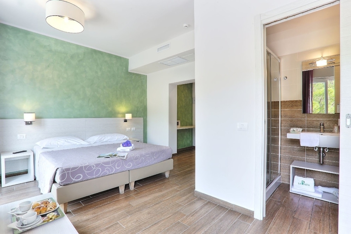 Imagen de la habitación del Hotel La Pineta, Follonica. Foto 8