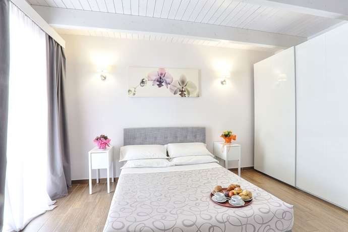 Imagen de la habitación del Hotel La Pineta, Follonica. Foto 15