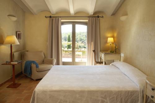 Imagen de la habitación del Hotel La Plaça Madremanya. Foto 6