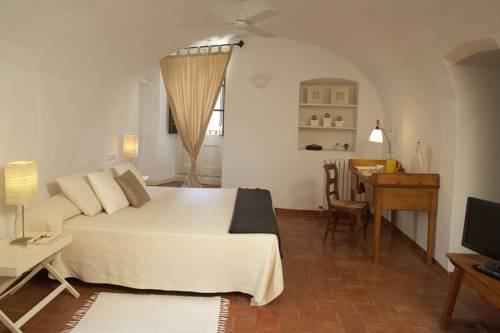 Imagen de la habitación del Hotel La Plaça Madremanya. Foto 10