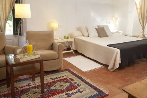 Imagen de la habitación del Hotel La Plaça Madremanya. Foto 11