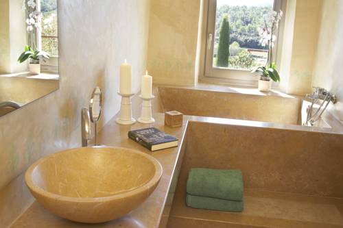 Imagen de la habitación del Hotel La Plaça Madremanya. Foto 14