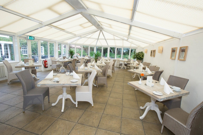 Imagen del bar/restaurante del Hotel La Place, Jersey. Foto 5