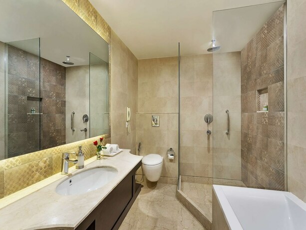 Imagen de la habitación del Hotel La Place Sarovar Portico, Lucknow. Foto 17