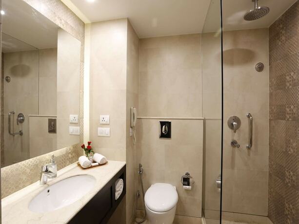 Imagen de la habitación del Hotel La Place Sarovar Portico, Lucknow. Foto 18