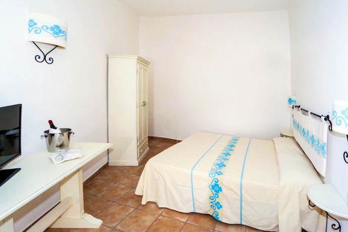 Imagen de la habitación del Hotel La Plage Resort, Marina di Sorso. Foto 10