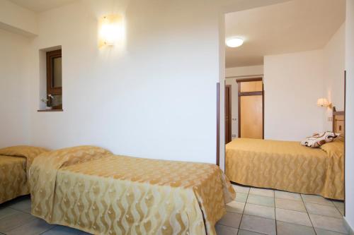 Imagen de la habitación del Hotel La Playa, Cala Gonone. Foto 8