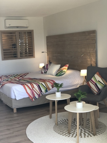 Imagen de la habitación del Hotel La Playa Orient Bay. Foto 14