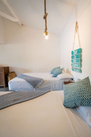 Imagen de la habitación del Hotel La Playita Beach House. Foto 6